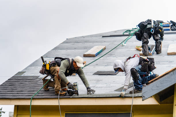 Professional Gutter Installation technician working in Malvern, IA